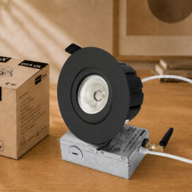 HiluX DS4 US recessed downlight in black shown with its retail box, Powered by Shelly