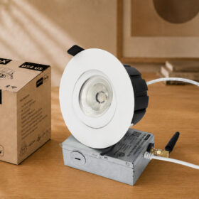 HiluX DS4 US recessed downlight in white shown with its retail box, Powered by Shelly