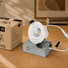 HiluX DS8 US recessed downlight in white shown with its retail box, Powered by Shelly