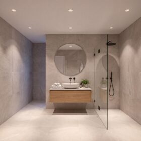 HiluX D7 Gen2 white recessed spotlights in a bathroom ceiling, grazing the stone-tiled walls and walk-in shower